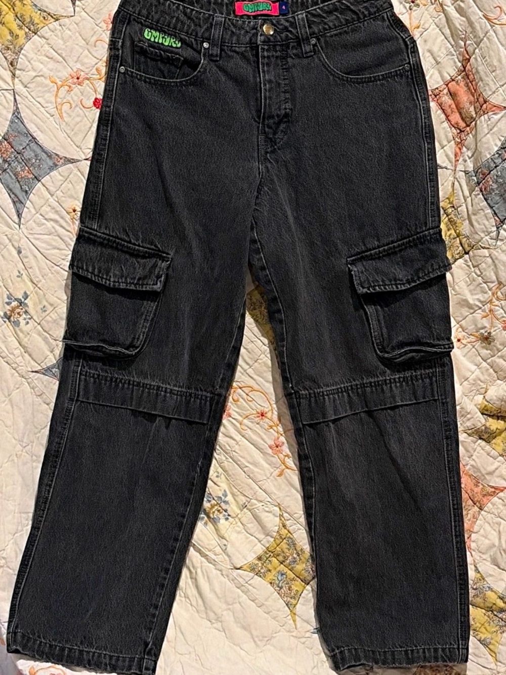 The Y2K Empyre Women's Black Denim Cargo Jeans are a stylish and functional addi